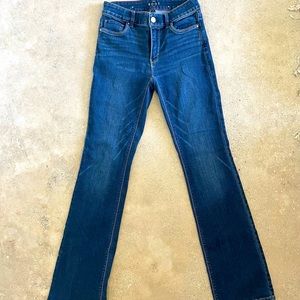 White House Black Market bootcut dark jeans.